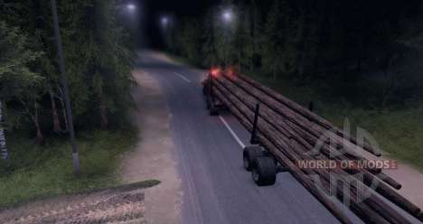 En la carretera de camiones KrAZ madera para Spin Tires